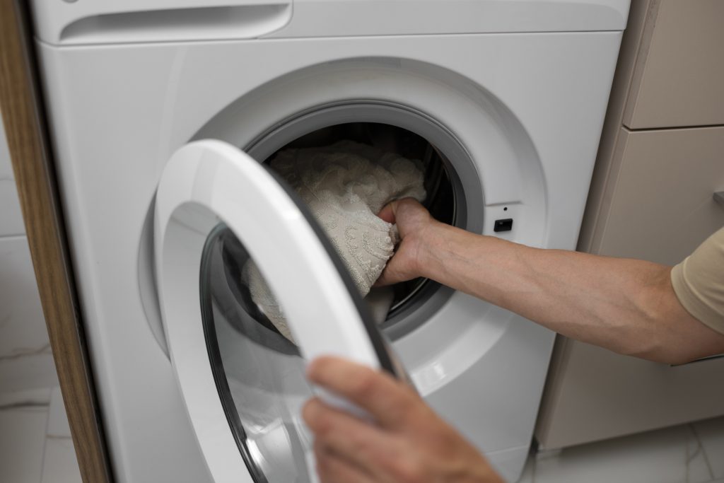 high-angle-adult-loading-washing-machine